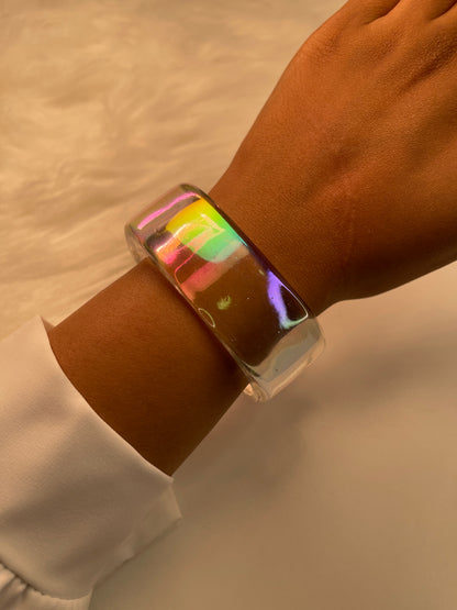 Transparent iridescent bracelet on the wrist 