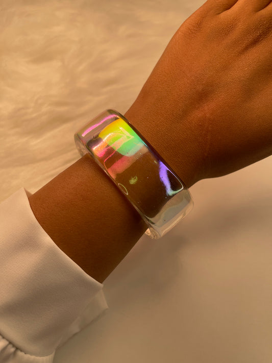 Transparent iridescent bracelet on the wrist 